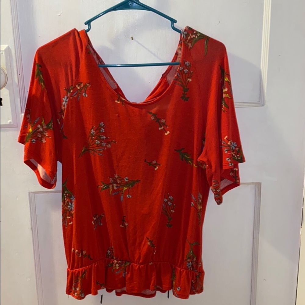 red floral top with tied open back